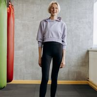 Professional fitness instructor Olga Zarichna smiling confidently